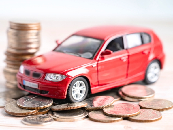 Miniature Red Car with Coins