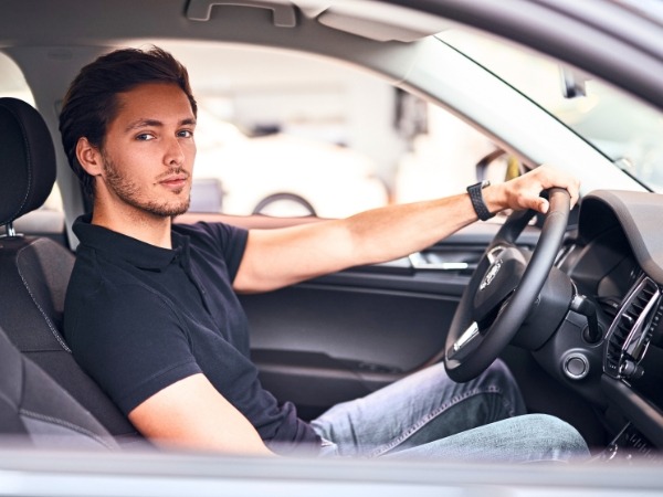 Man Driving a Car
