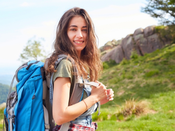 Woman Hiking a Mountain